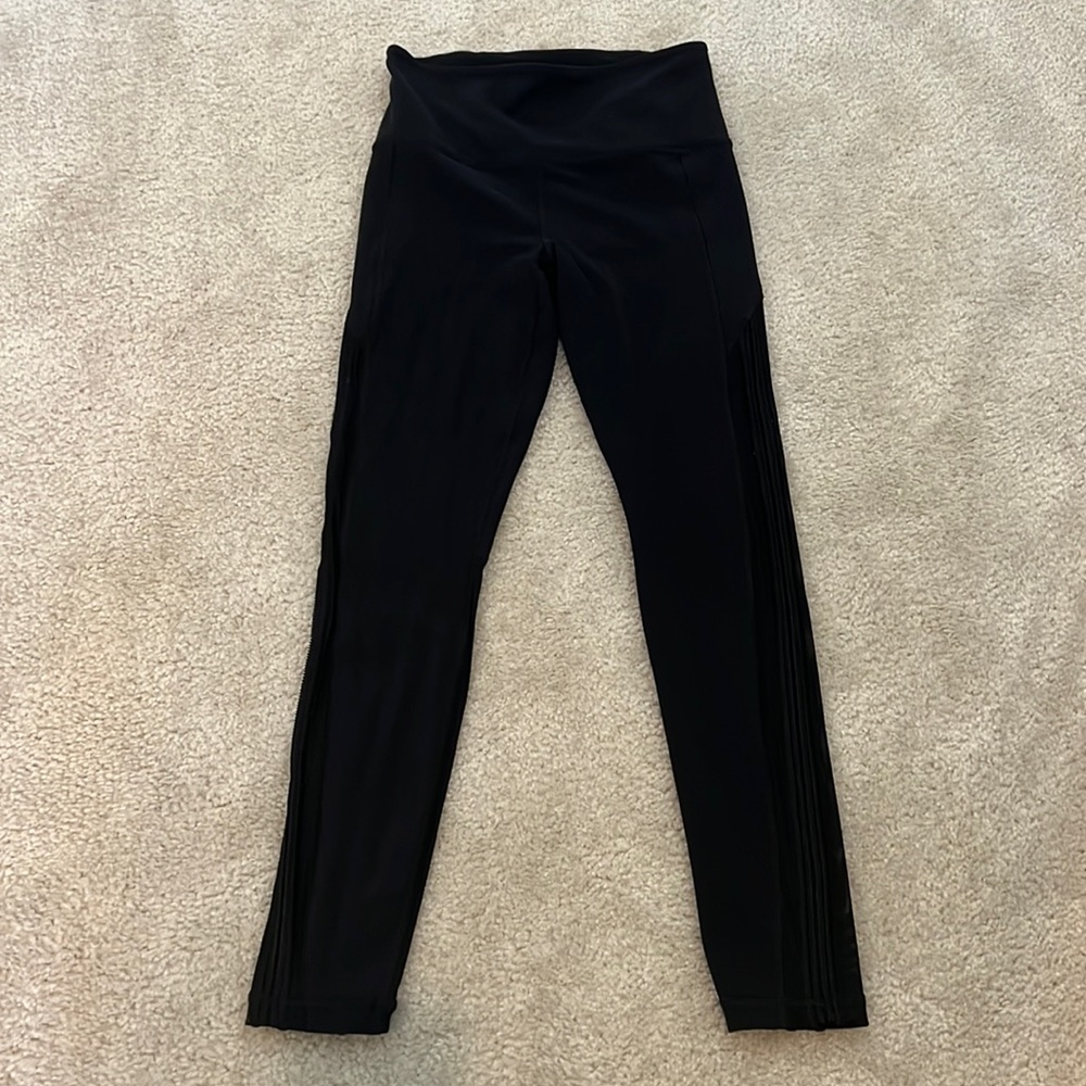 Athleta brand mesh paneled leggings.